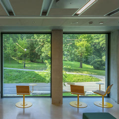 Modern Swivel Outdoor Chair with Integrated Side Table