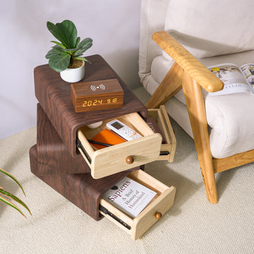 Wooden nightstand with drawers next to a bed in a bedroom setting